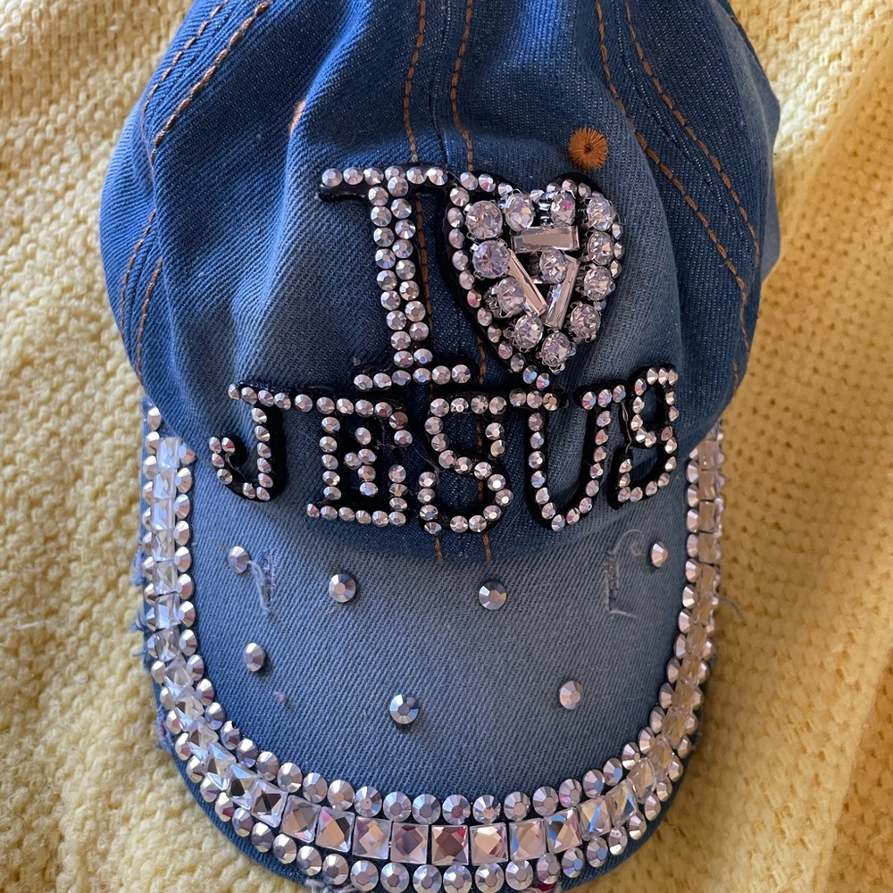 Distressed denim and rhinestone cap